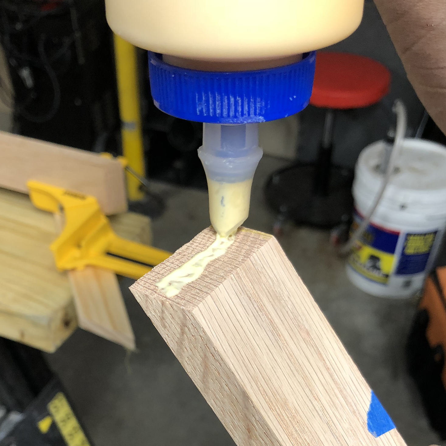 Applying wood glue to miter cuts