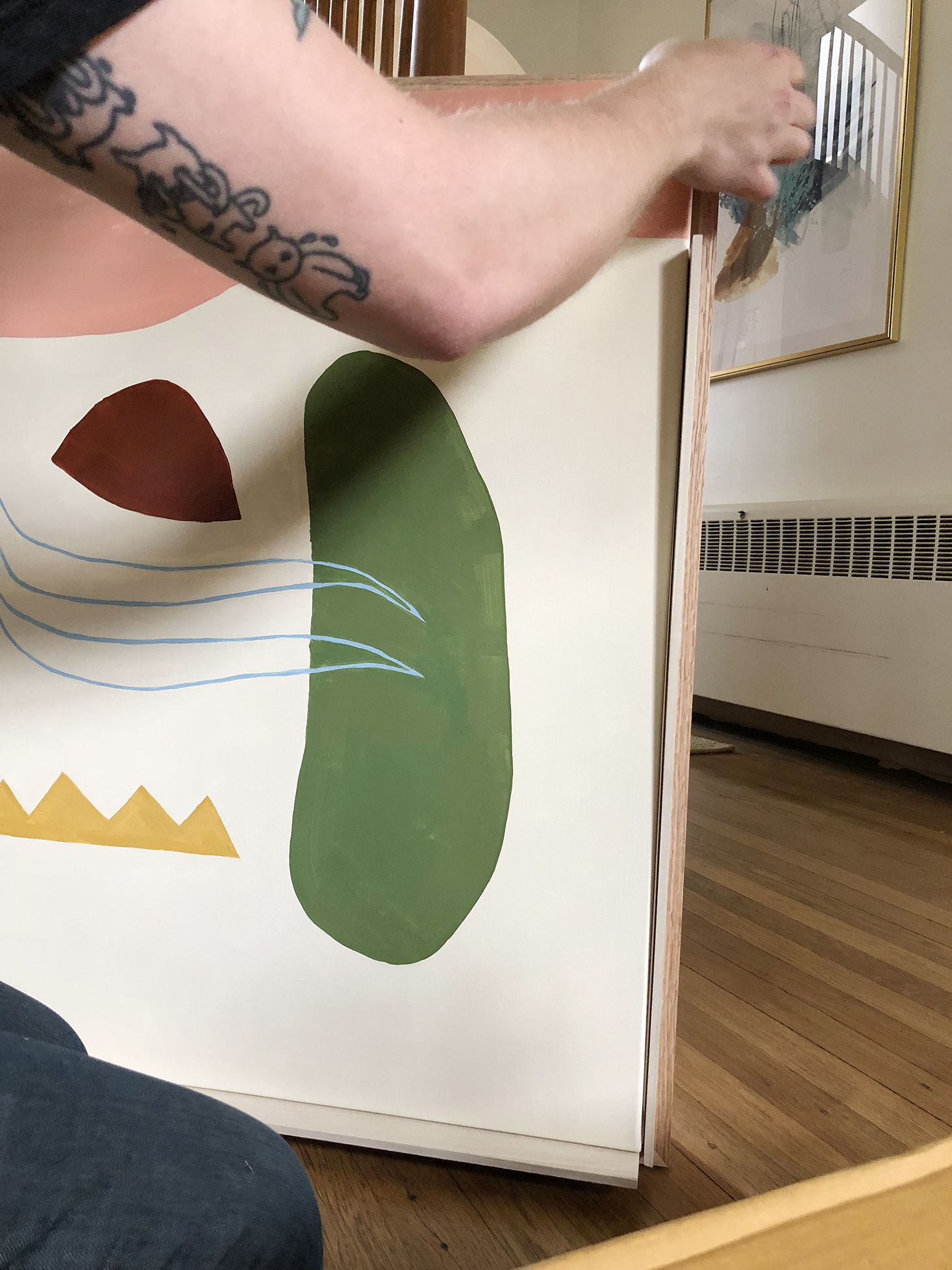 Using shims to place canvas in frame with equal spacing