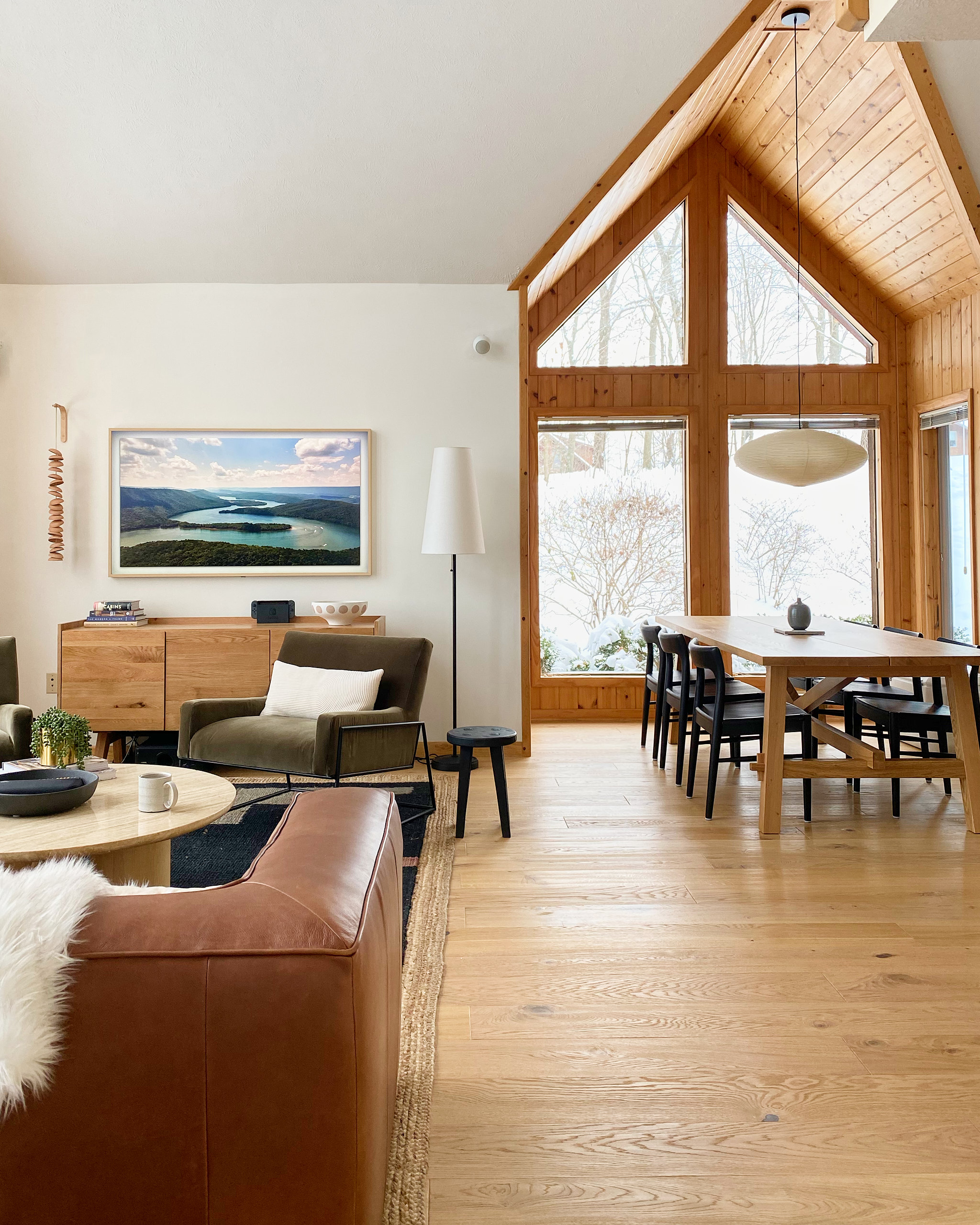 Cabin Interior with wood floors and a view of the snow